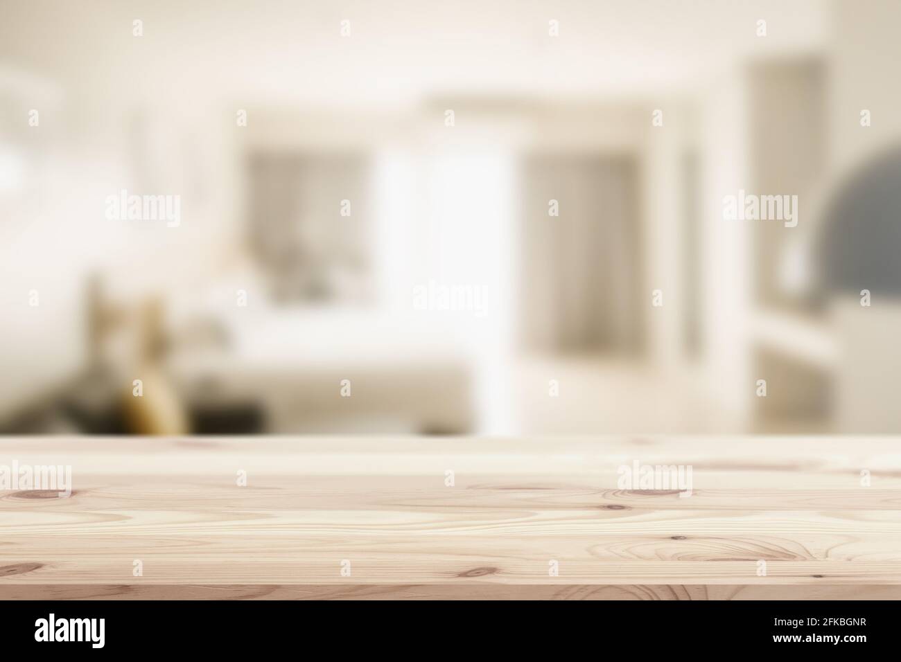 Wooden table top in home or hotel bed room blur background for montage sleeping or house products display or backdrop design layout. Stock Photo