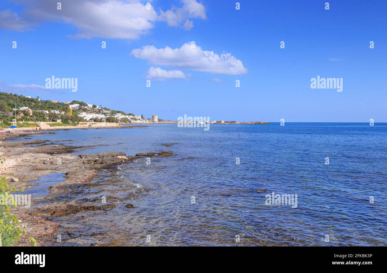 Salento coast, Ionian sea:panoramic view of Torre Vado town, Italy (Apulia). In the background the beach and the tourist port with the watchtower. Stock Photo