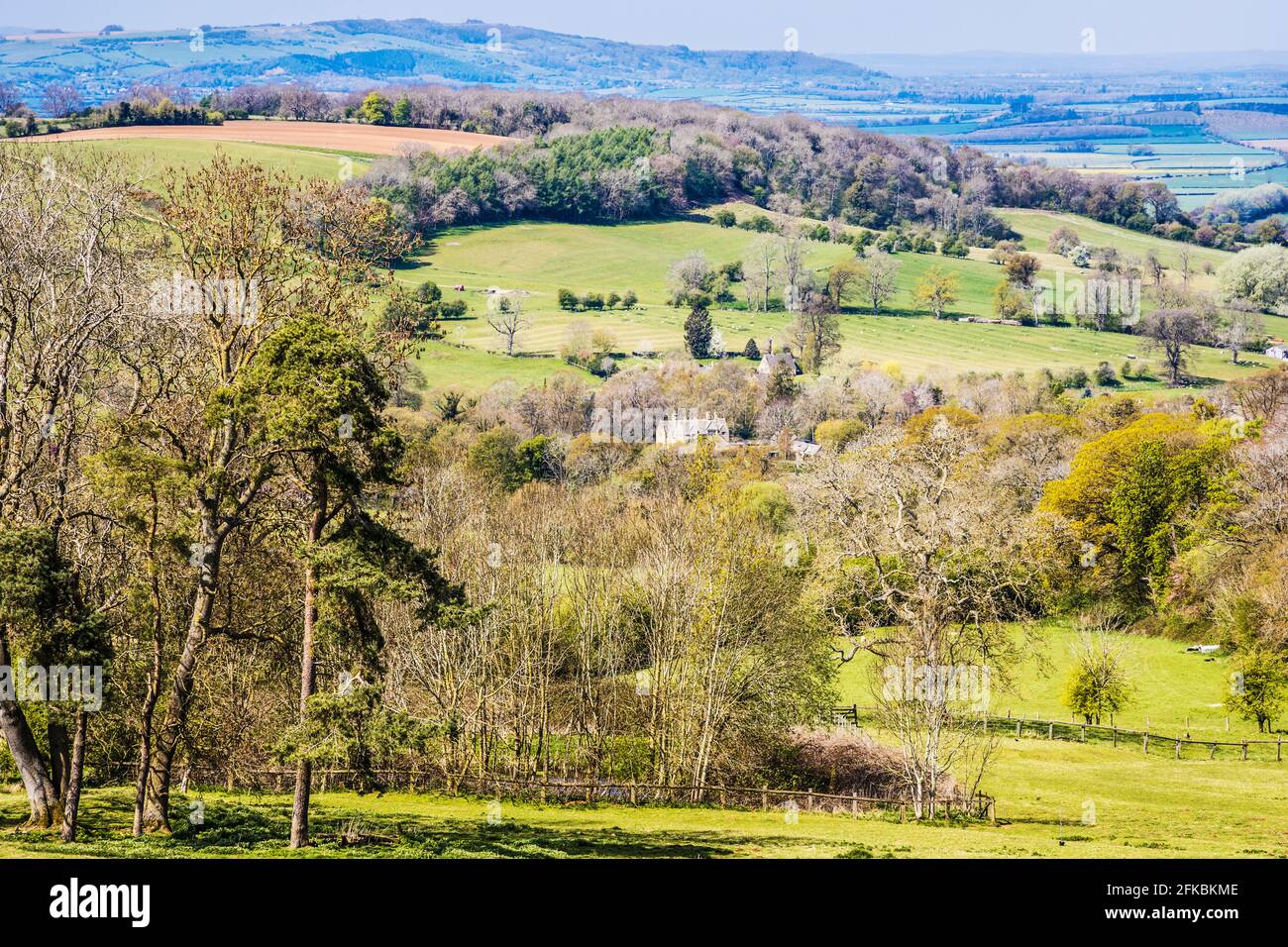 Spring view over rolling countryside in the Worcestershire Cotswolds. Stock Photo