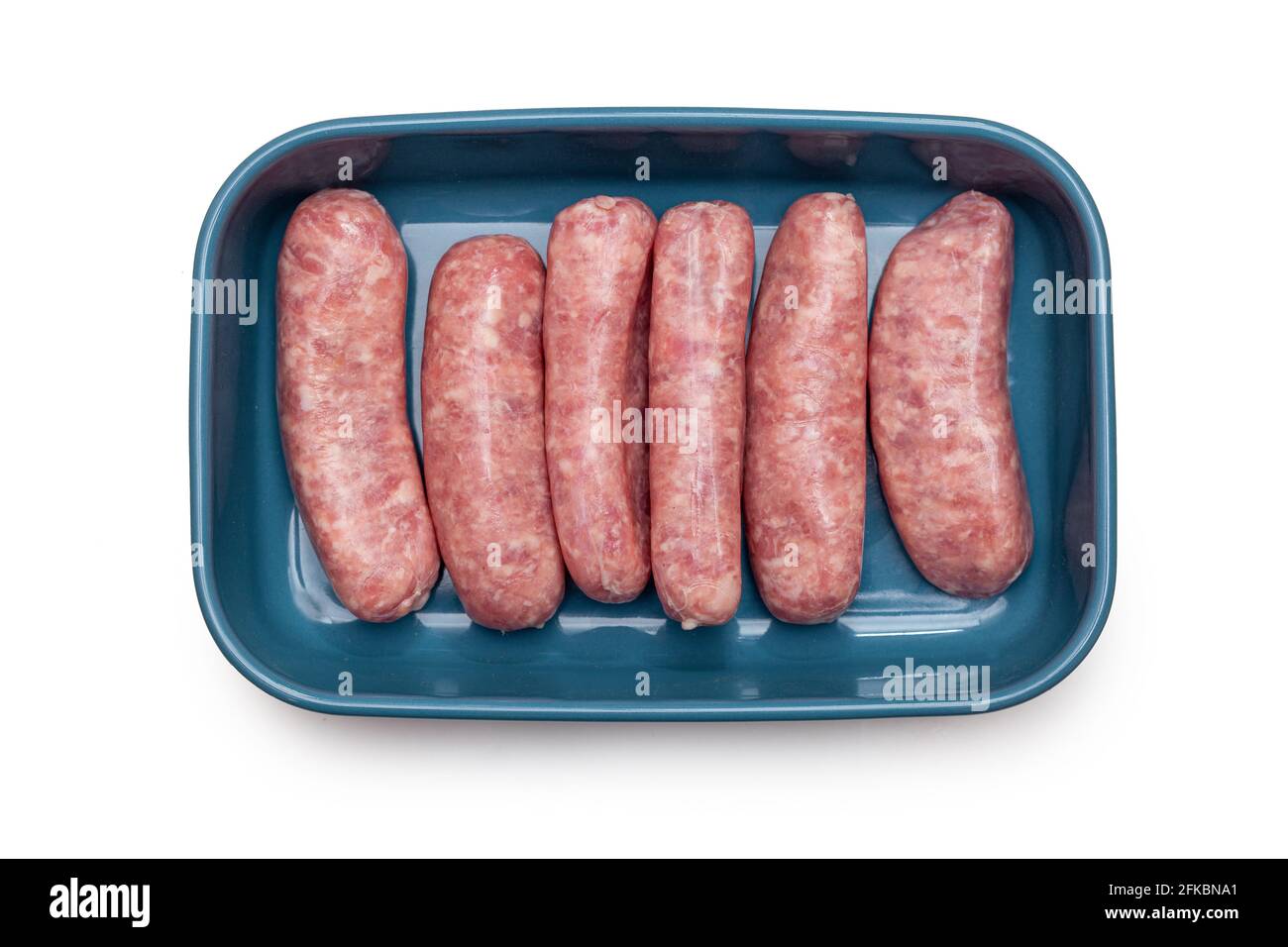 Six Uncooked Wild Boar Sausages in a rectangular blue dish Stock Photo