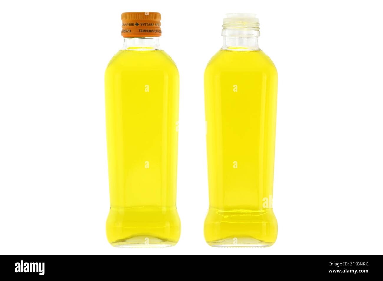 Glass bottles of Olive Oil with mild taste isolated on white background Stock Photo