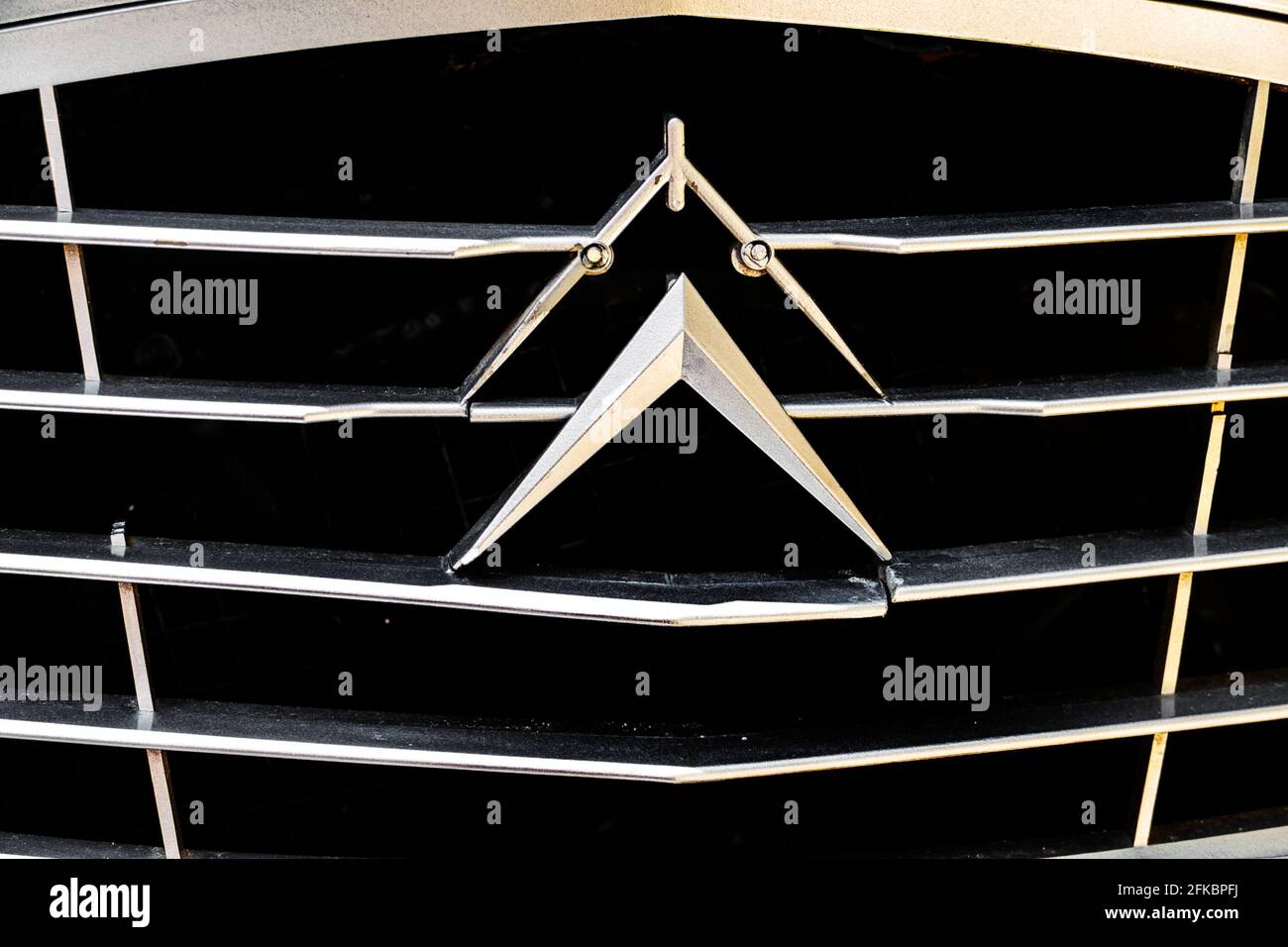 Grid grille in the hood with logo Ciroen close up on the classic Citroen vintage car in Danang, Vietnam - march, 09, 2020 Stock Photo