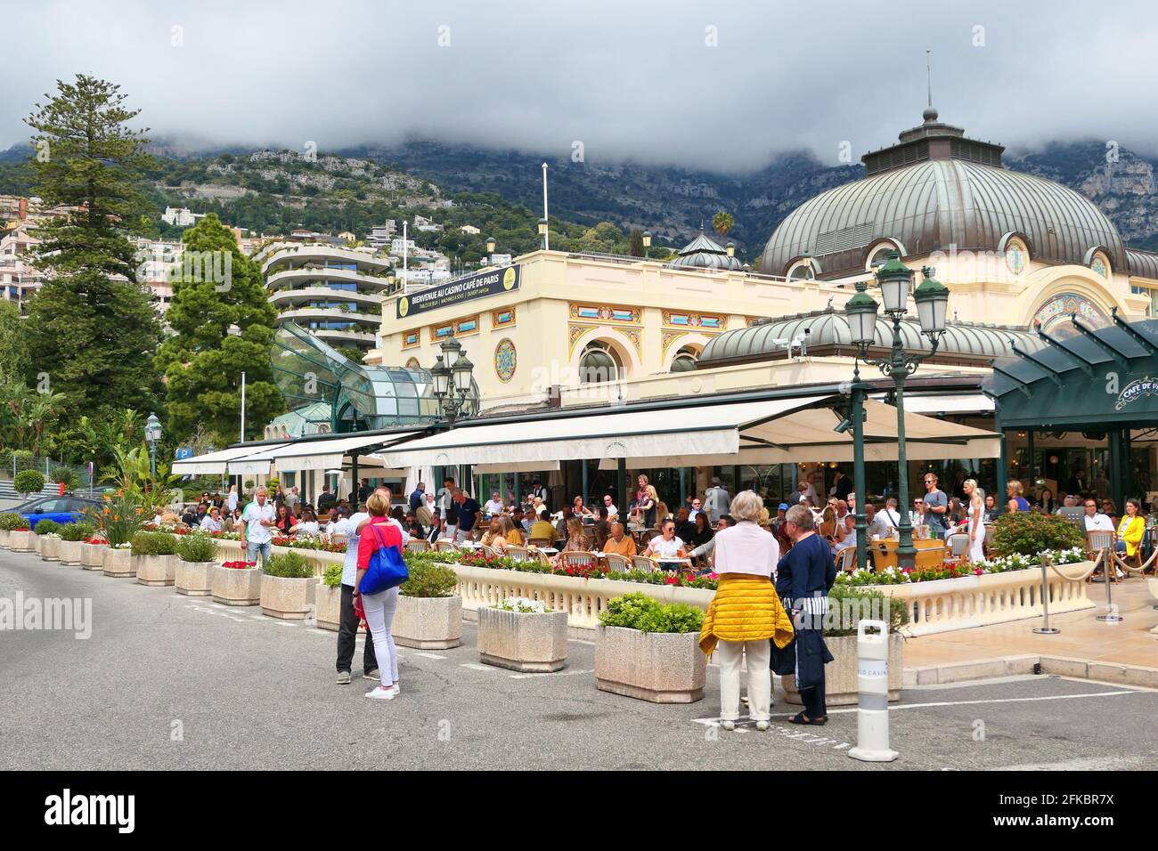 Monte Carlo, Monaco - May 1, 2019: Famous Casino Cafe de Paris in Monte Carlo in Monaco. Outdoor street landmark of Monaco. Stock Photo