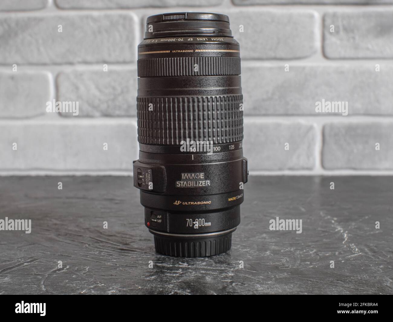 Russia, Krasnodar - April 2, 2021: Canon zoom lens with a focal length of 70-300mm F4-5.6 for the EF mount Stock Photo
