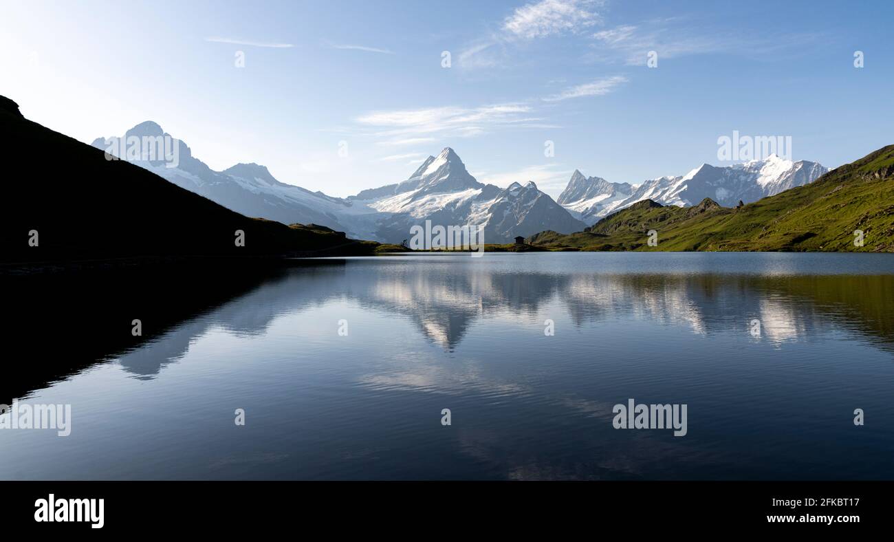 Schreckhorn mountain reflected in Bachalpsee lake at dawn, Grindelwald, Bernese Oberland, Bern Canton, Switzerland, Europe Stock Photo