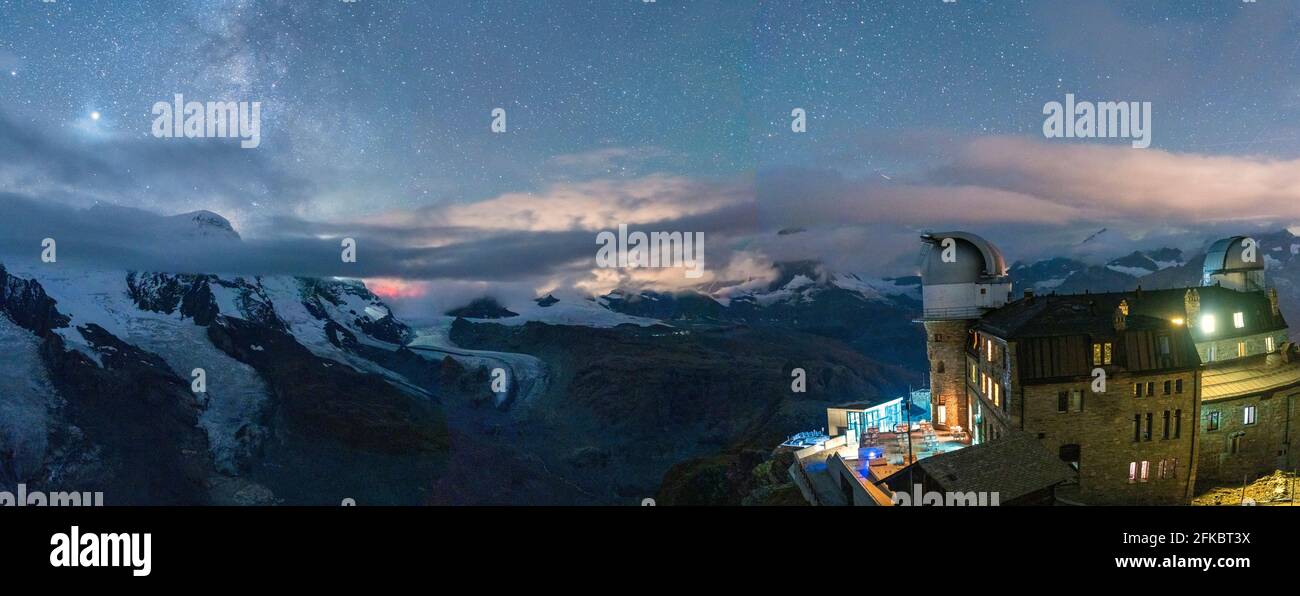 Stars over the snowcapped mountains and Kulmhotel Gornergrat, Zermatt, canton of Valais, Switzerland, Europe Stock Photo