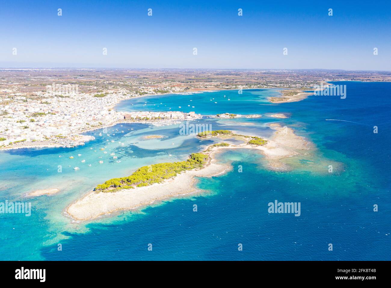 Aerial view of Porto Cesareo coastal town washed by the clear sea, Lecce province, Salento, Apulia, Italy, Europe Stock Photo