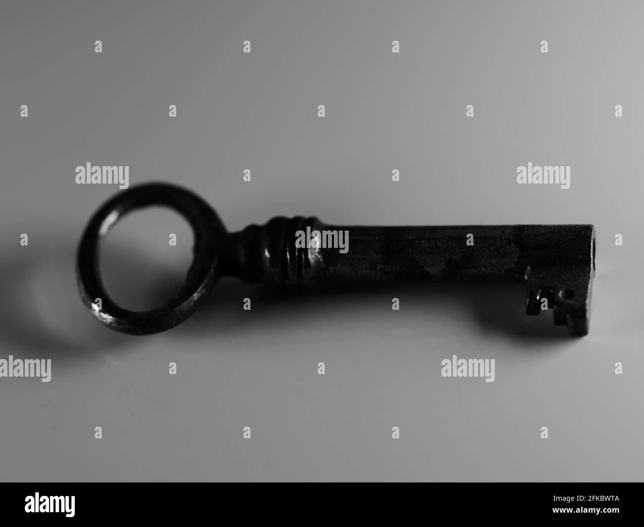 A golden key isolated on white background. Old rusty door key. Antique ...
