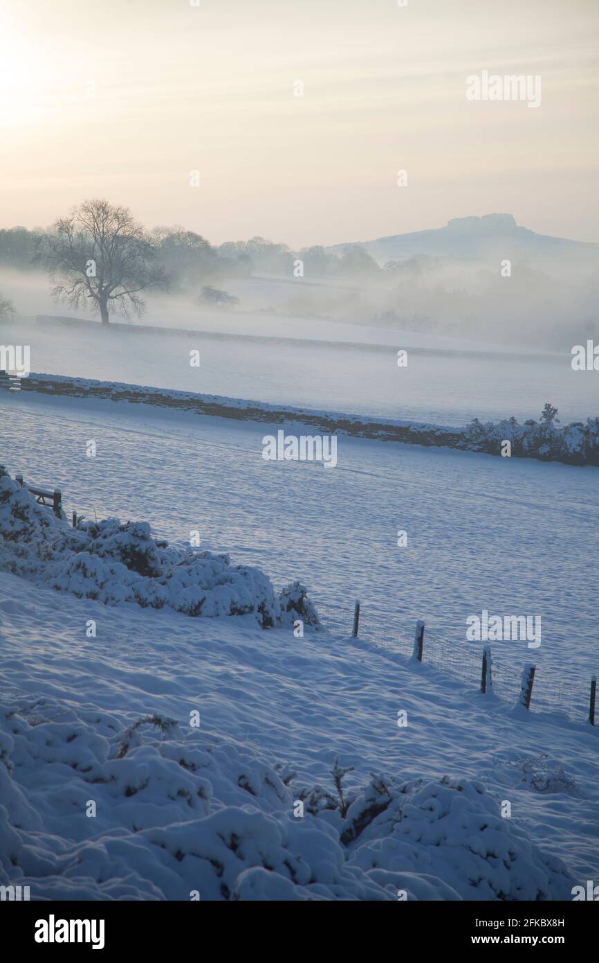 View of Almscliff Crag in the snow, Wharfe Valley, North Yorkshire, England, United Kingdom, Europe Stock Photo