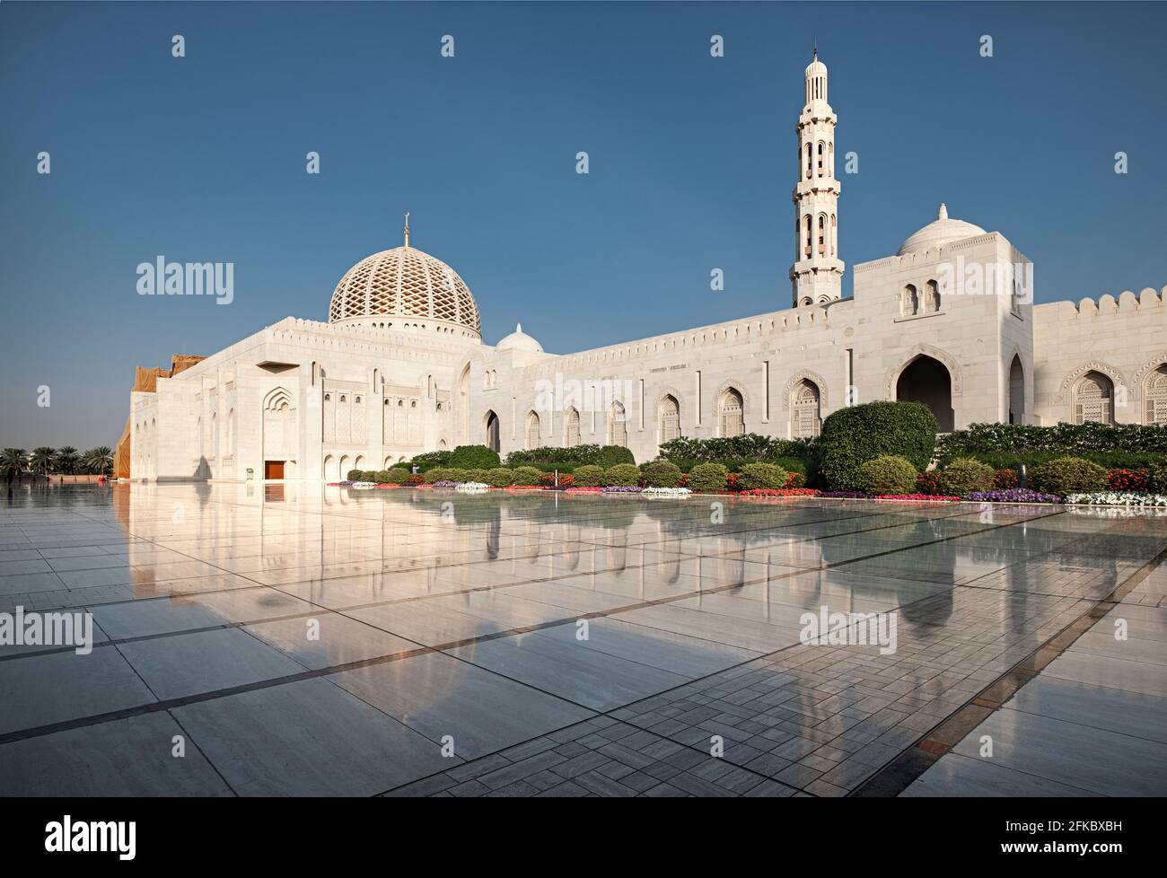 Sultan Qaboos Mosque reflected in the shiny marble floor, Muscat, Oman, Middle East Stock Photo