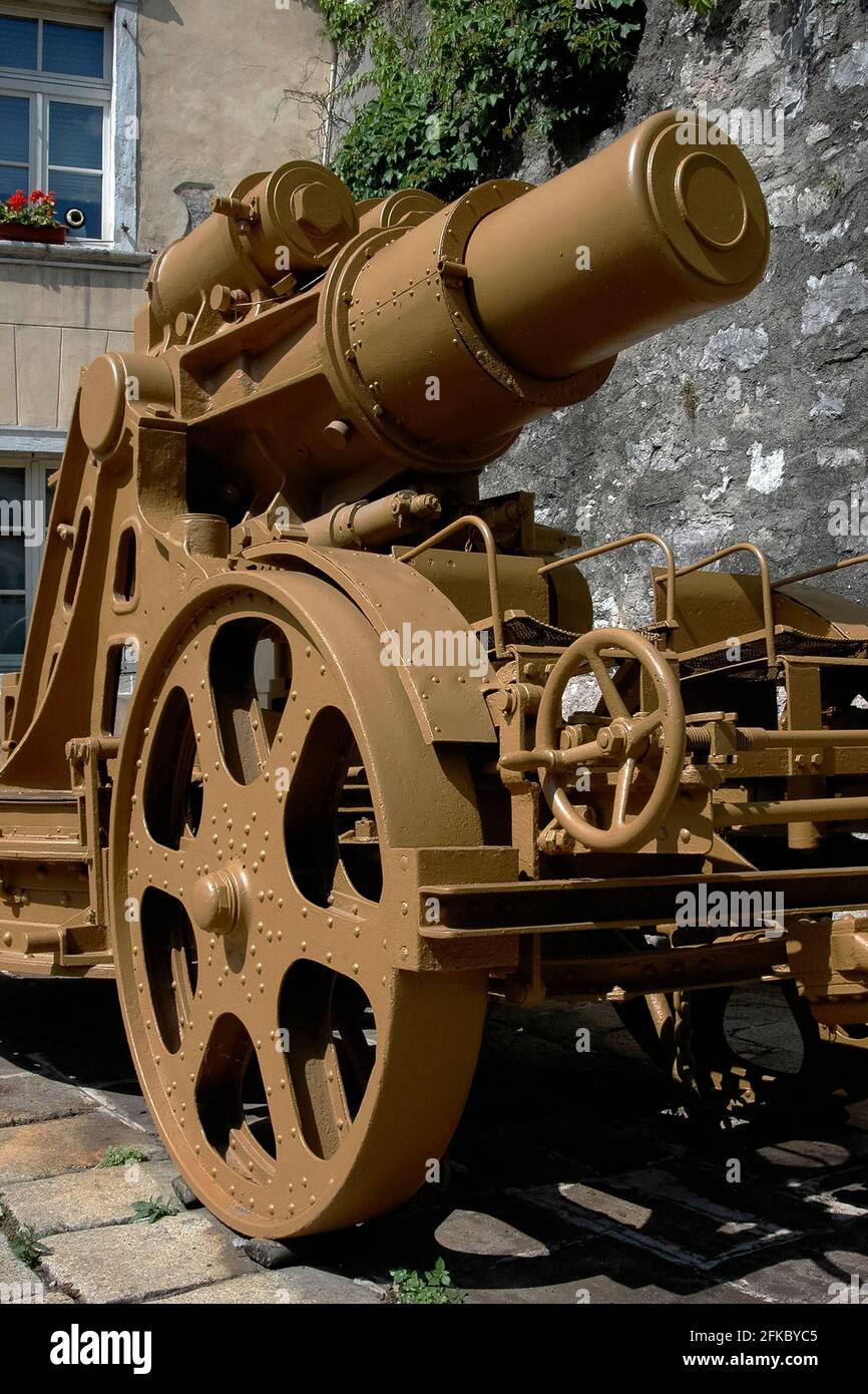 One of three surviving examples of the concrete-piercing Škoda 30.5 cm Mörser M.11 heavy siege howitzers used by Austria-Hungary on its Italian and eastern fronts in World War I, and also by Nazi Germany in World War II, displayed outside the Museo Storico Italiano della Guerra (Italian War History Museum) at Rovereto, Trentino-Alto Adige, Italy.  It fired 305 mm (12 ins) shells that could penetrate reinforced concrete up to 2 m thick, blow a crater 8 m (26 ft) wide and deep, and kill enemy soldiers up to 400 m (1,312 ft) from the blast. Stock Photo