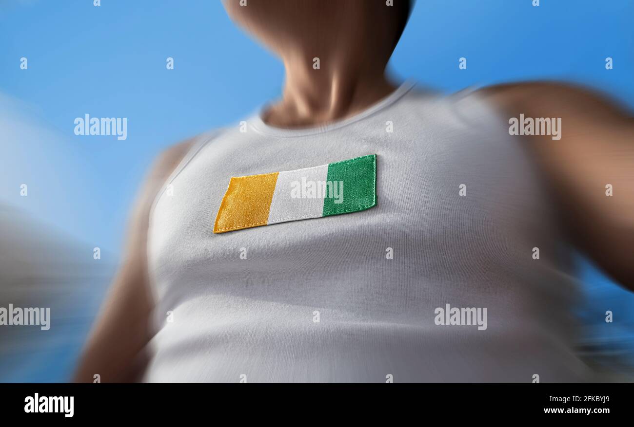 The national flag of Cote dIvoire on the athlete's chest Stock Photo