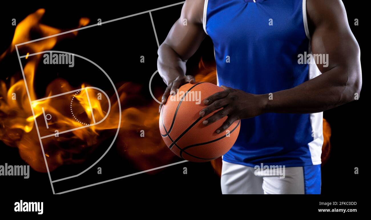 Composition of midsection of basketball player holding basketball over