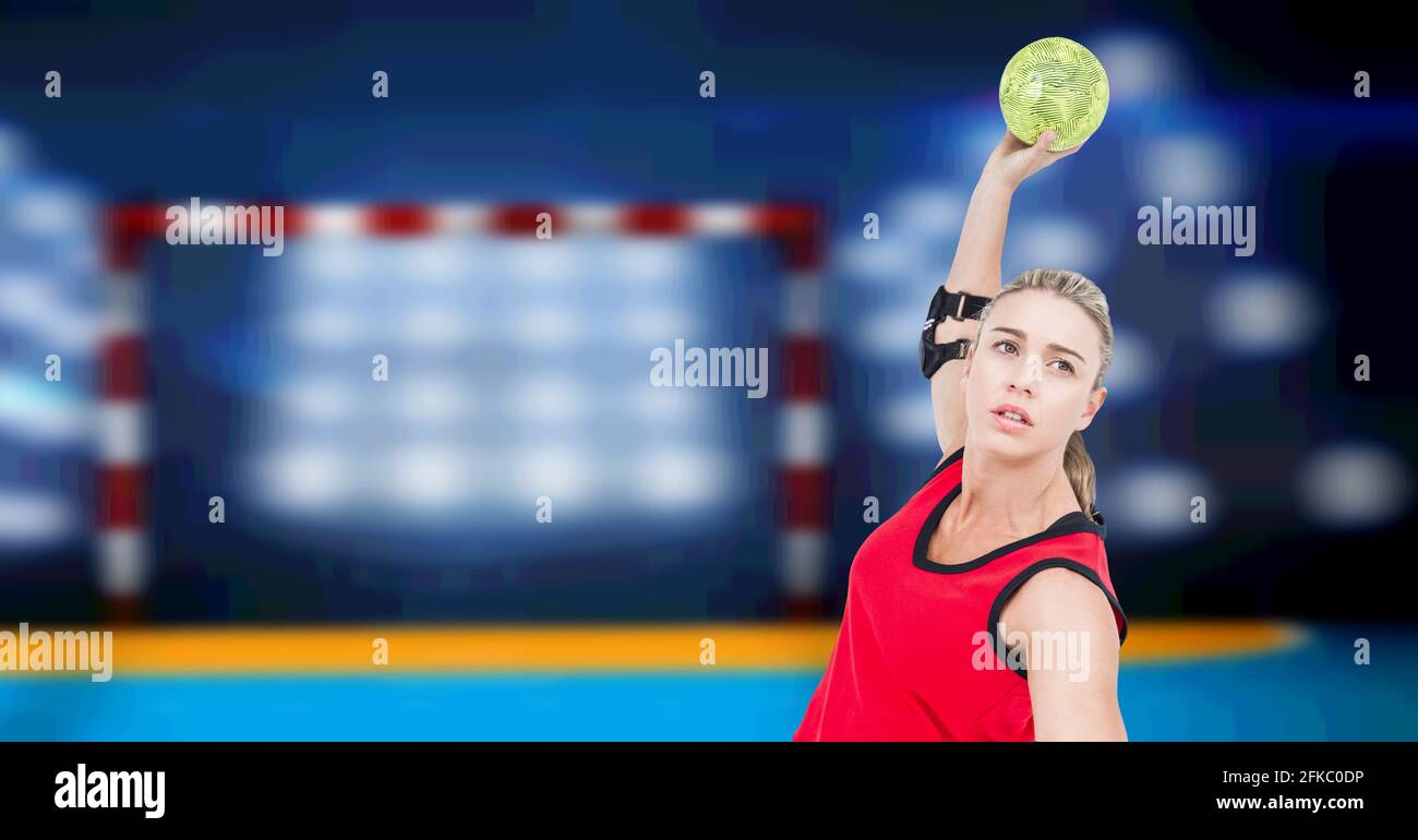 Composition Of Female Handball Player Throwing Ball On Handball Pitch Composition Of Female Handball Player Throwing Ball On Handball Pitch
