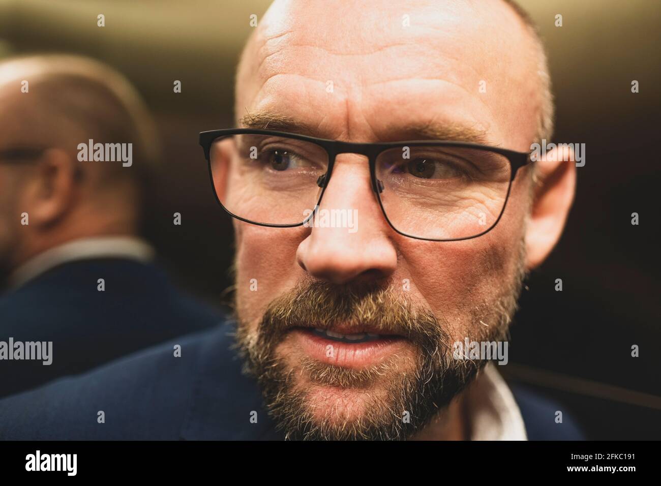 Businessman with eyeglasses looking away Stock Photo