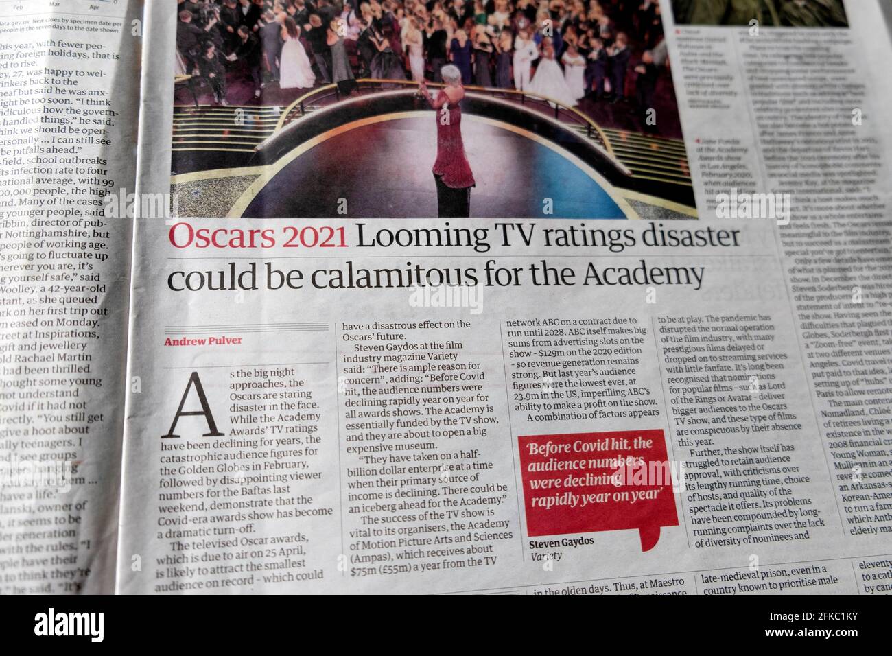 'Oscars 2021 Looming TV ratings disaster could be calamitous for the Academy' Guardian newspaper headline inside article 17 April 2021 London UK Stock Photo