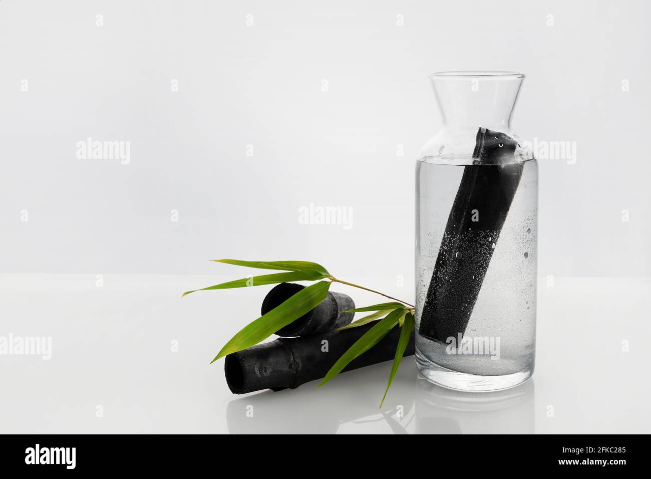 Natural Bamboo charcoal water filter. Deodorization, air filtration, and purifier water concept. Stock Photo