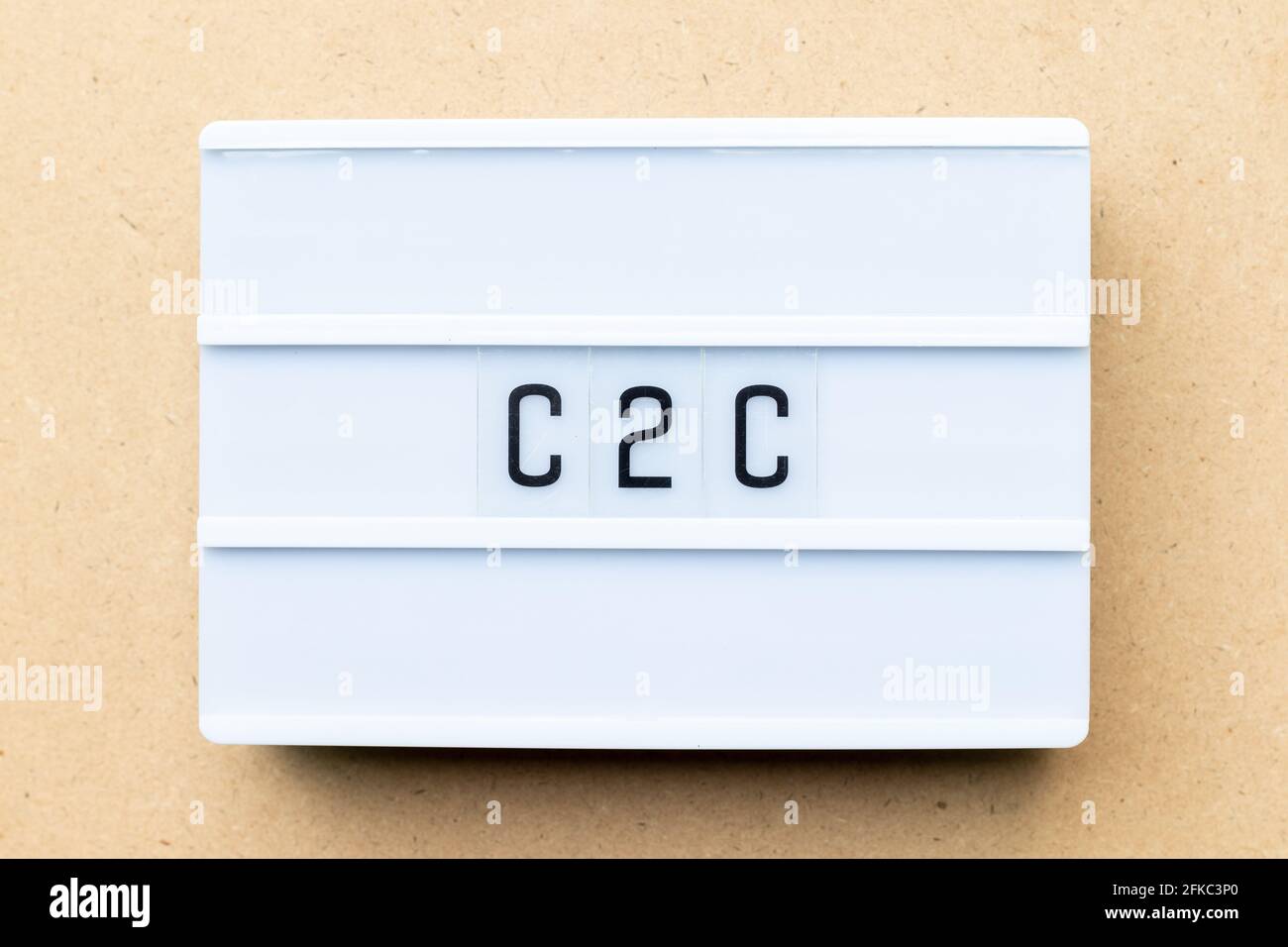 White lightbox with word C2C (Abbreviation of customer to customer) on ...
