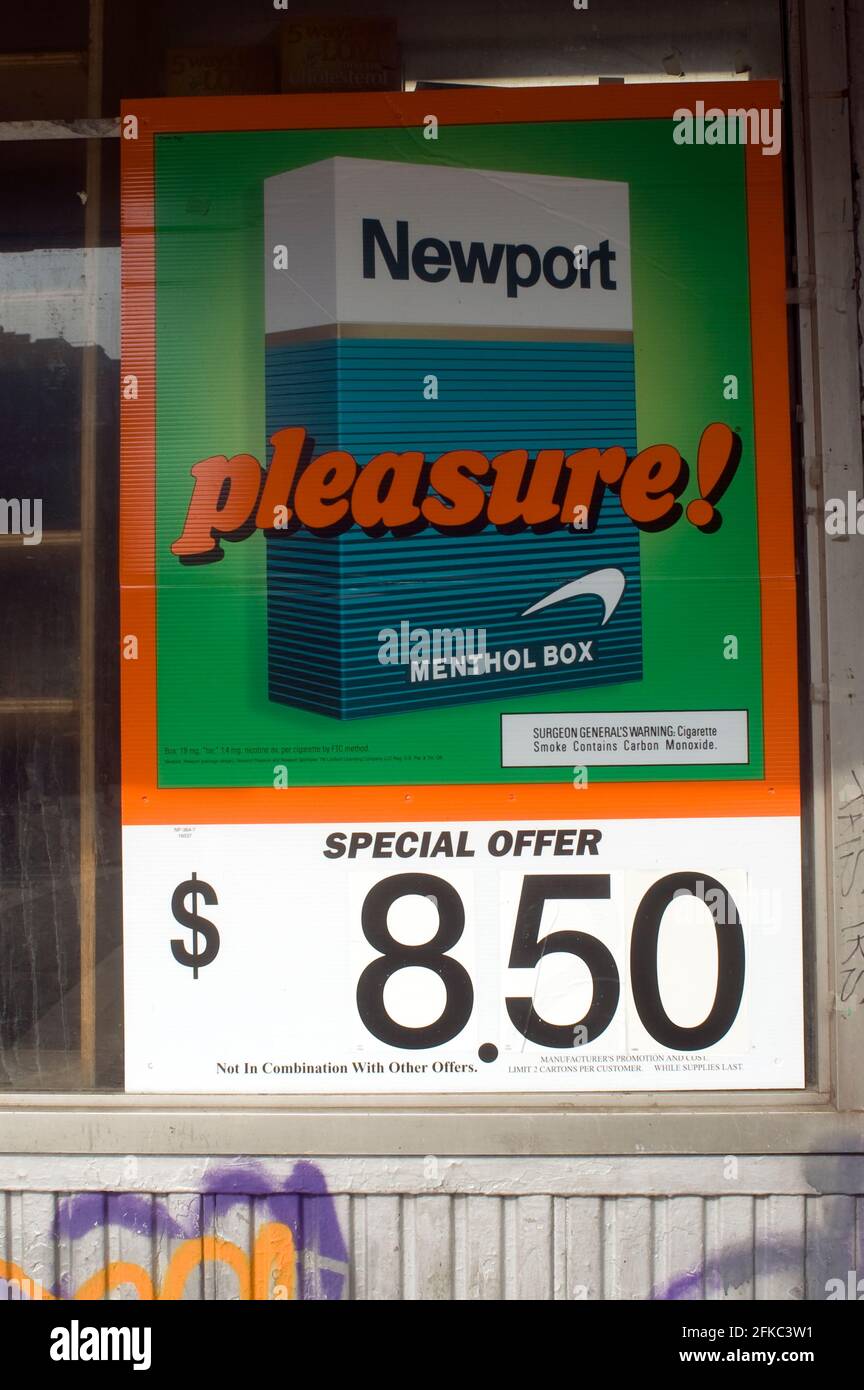 Advertisement for cigarettes on the wall of a grocery store in New York on Saturday, September 13, 2008. Legislation working it's way through Congress would give the Food and Drug Administration power to oversee tobacco products, notably additives which flavor the cigarettes making them popular with the young. Tobacco companies are fighting to have menthol excluded as an additive because menthol cigarettes are popular in the African-American community and account for one-fourth of the American cigarette market. (Photo by Frances M. Roberts) Stock Photo