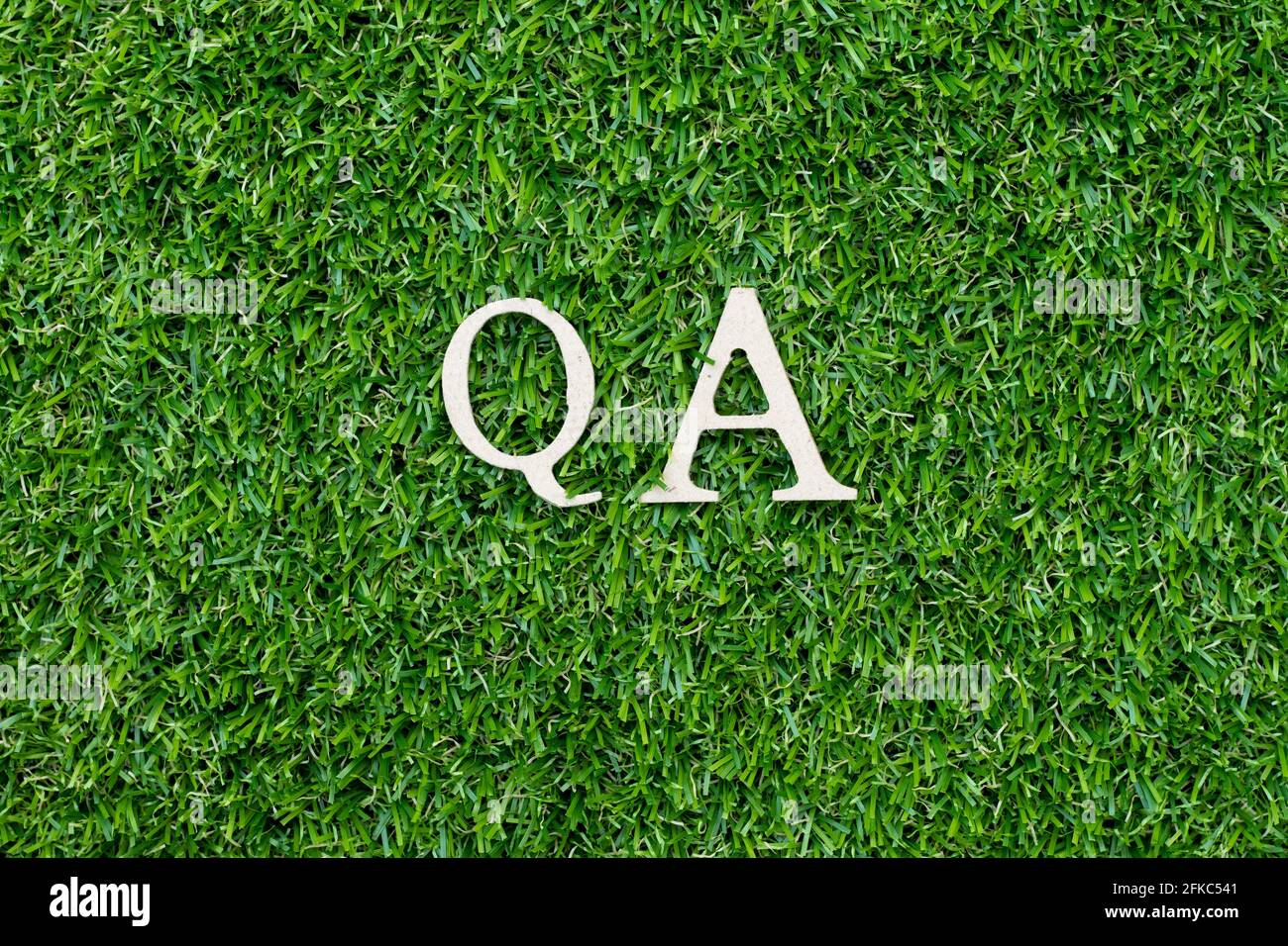 Wood Alphabet Letter In Word QA abbreviation Of Quality Assurance Or