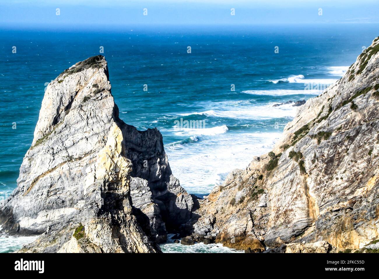 Beautiful Ursa beach with its colossal rock formations and the blue Atlantic Ocean Stock Photo
