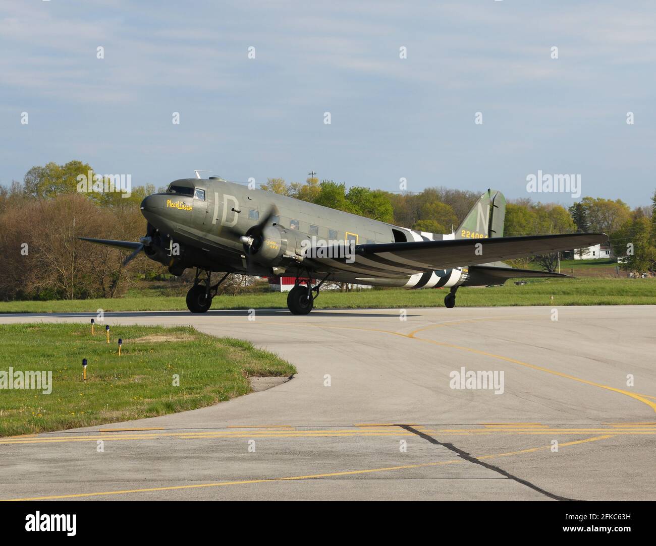 World War 2 C-47 airplane named Placid Lassie. This restored historic aircraft led over 800 C-47’s over the drop zones of Normandy, France on D-Day - Stock Photo