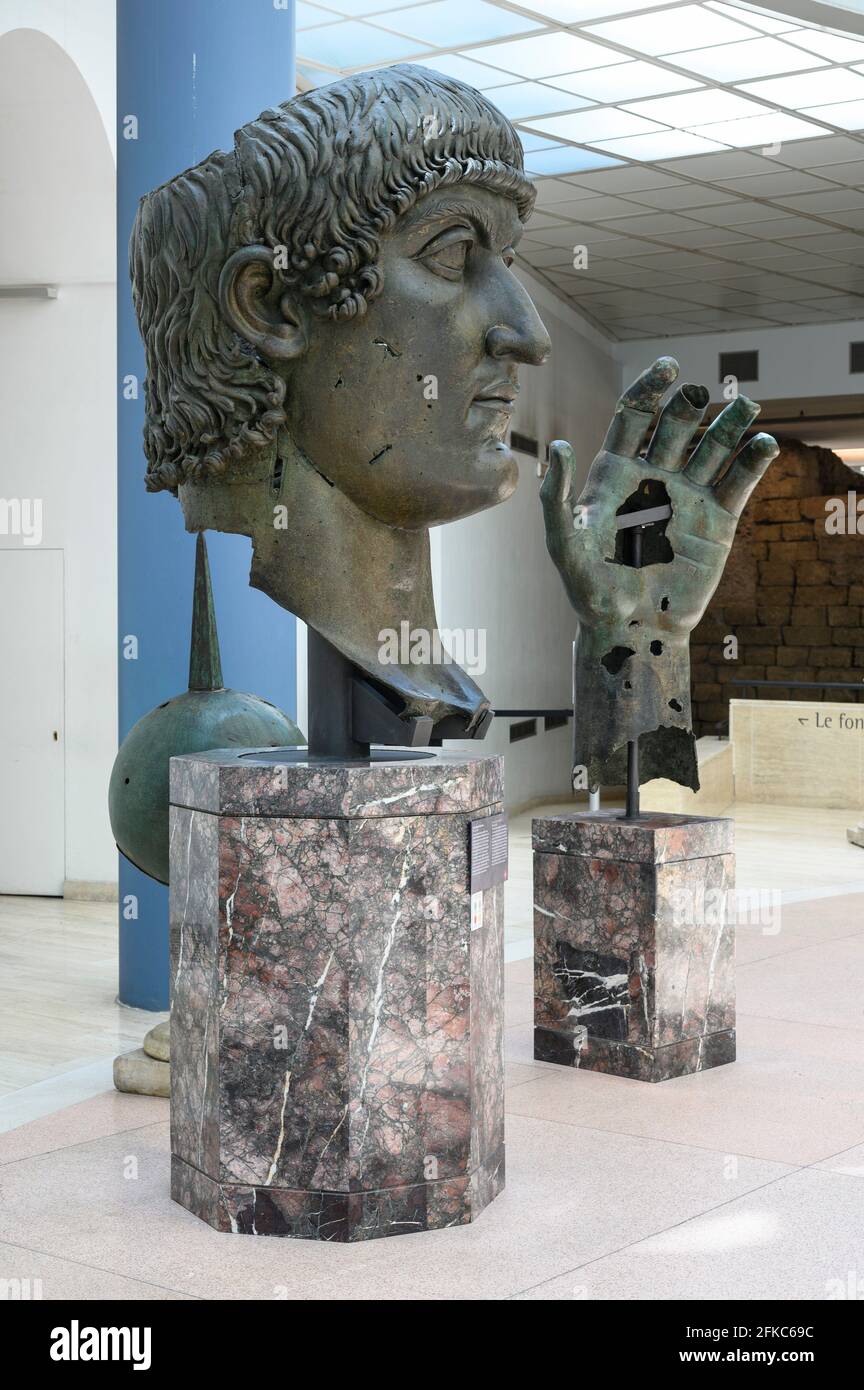 Rome. Italy. (April 2021) Fragments of the colossal bronze statue of Constantine the Great, 4th C AD, the hand has been recently restored with the add Stock Photo