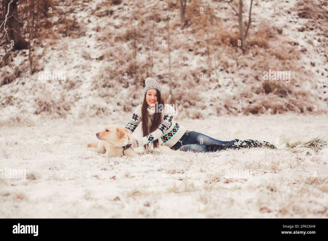 positive girl playing with dog in park Stock Photo - Alamy