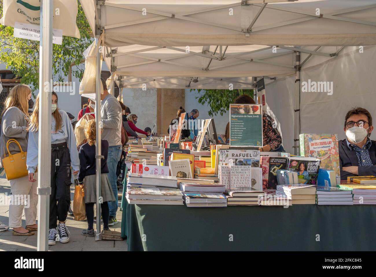 Palma de Mallorca; april 23 2021: Festivity of Sant Jordi or Book Day in the historic center of Palma de Mallorca in times of the Coronavirus pandemic Stock Photo