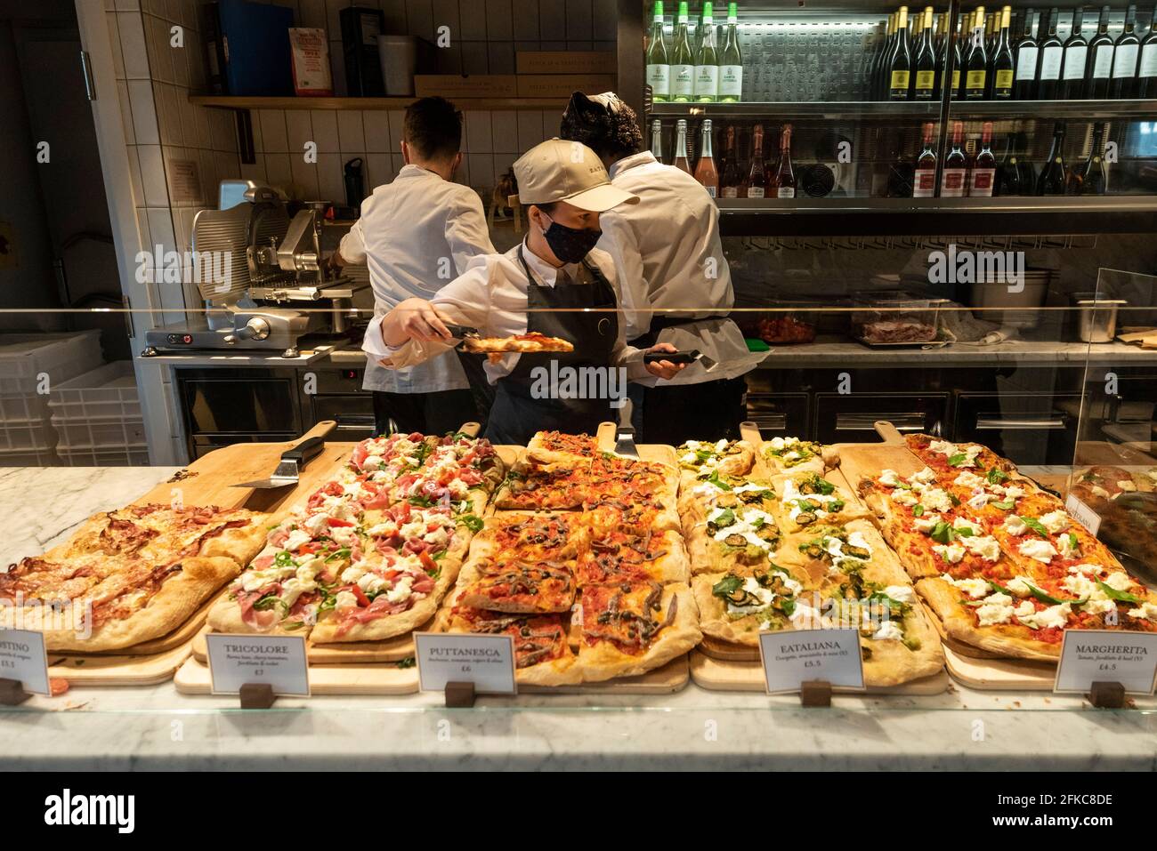 London, UK. 30th Apr, 2021. Fresh pizza counter as Eataly London opens in  Bishopsgate. The huge store is the first one to open in the UK and joins 42  others around the