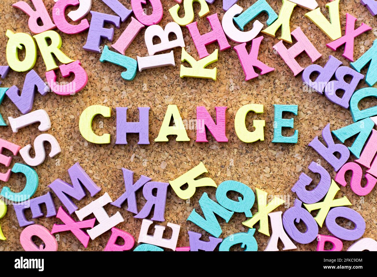 Color alphabet in word change with another letter as frame on cork