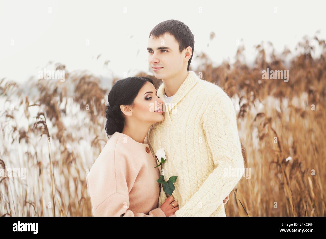 gentle portrait of a young couple. Winter nature Stock Photo