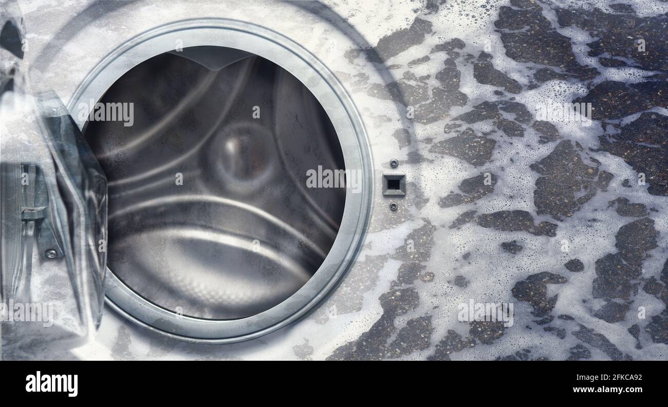 Breakdown of the washing machine. Opened washing machine in pouring