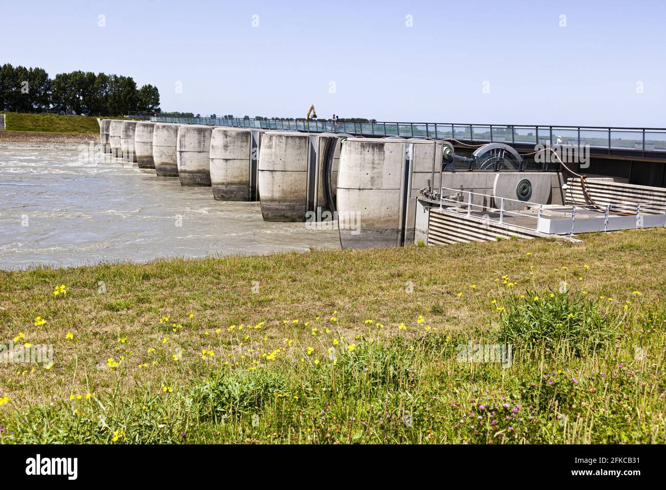 The barrage on the River Couesnon set up to restore the nature of the bay at Mont Saint Michel, Normandy, France Stock Photo