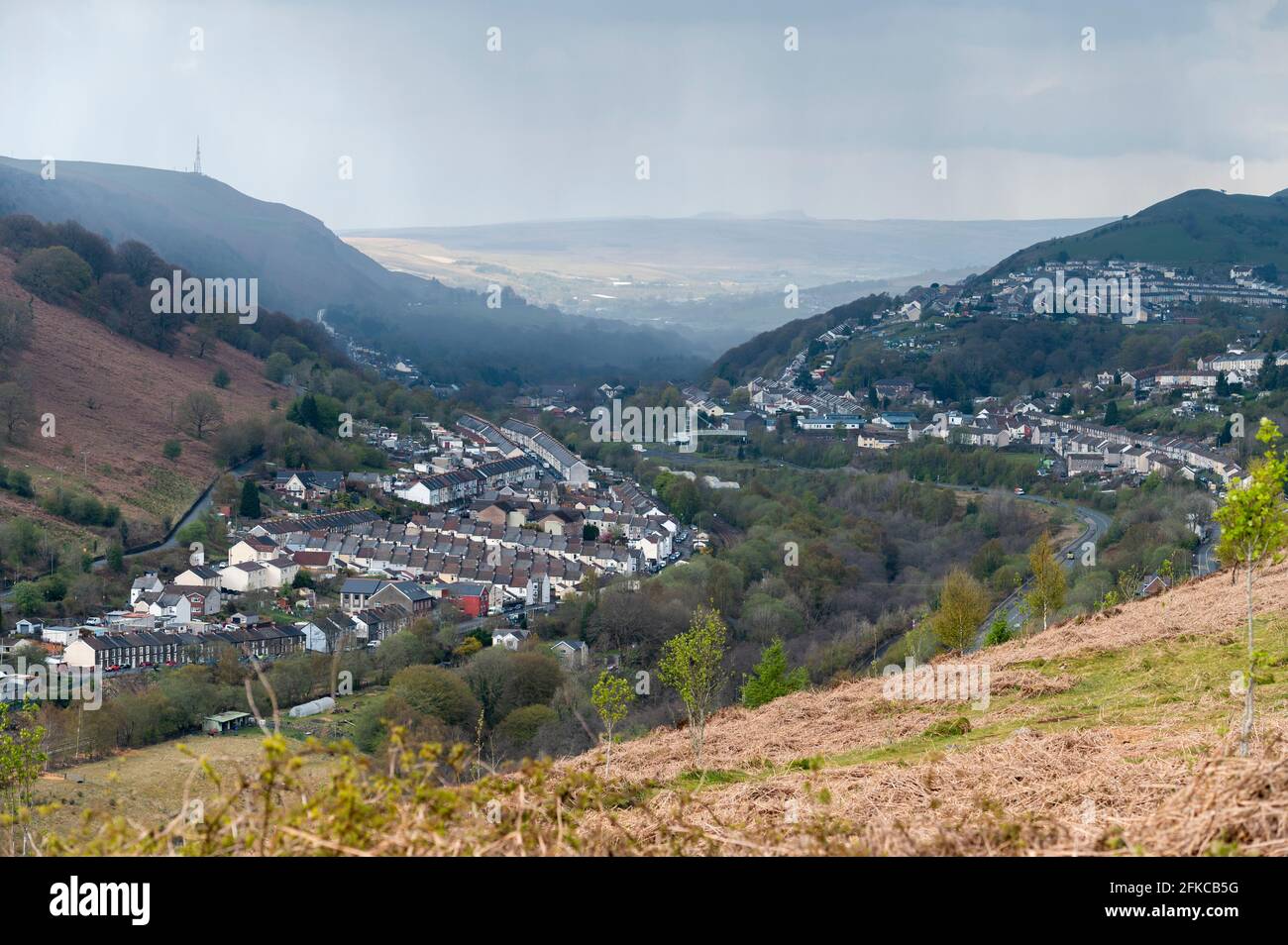 A Bentley Continental GT V8 luxury sports car pictured against a backdrop of the Rhymney Valley in South East Wales. Stock Photo