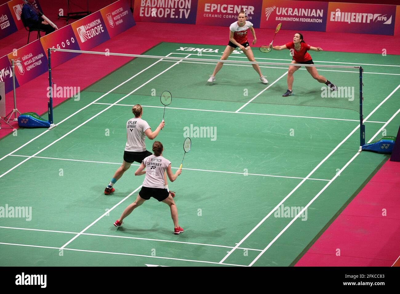 KYIV, UKRAINE - APRIL 30, 2021 - Linda Efler and Isabel Herttrich of  Germany (white kit) compete against Chloe Birch Lauren Smith of England  (red kit) during the women's doubles quarter-final match