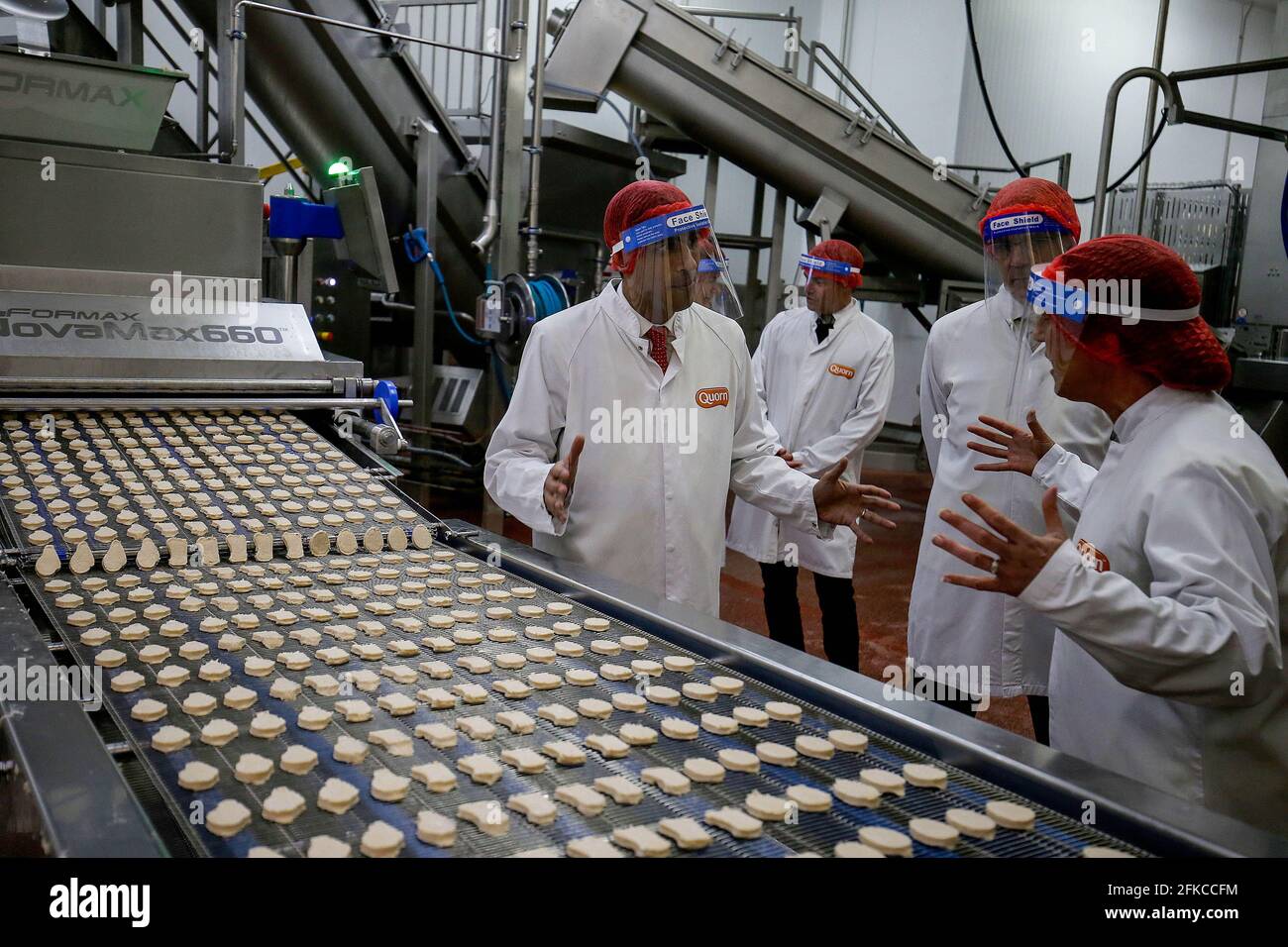 EDITORIAL USE ONLY Rishi Sunak, MP for Richmond, looks at the production line during a visit to Quorn Foods' headquarters in Stokesley in his local constituency in North Yorkshire, to discuss climate change and how to build a more sustainable global food system. Picture date: Friday April 30, 2021. Stock Photo