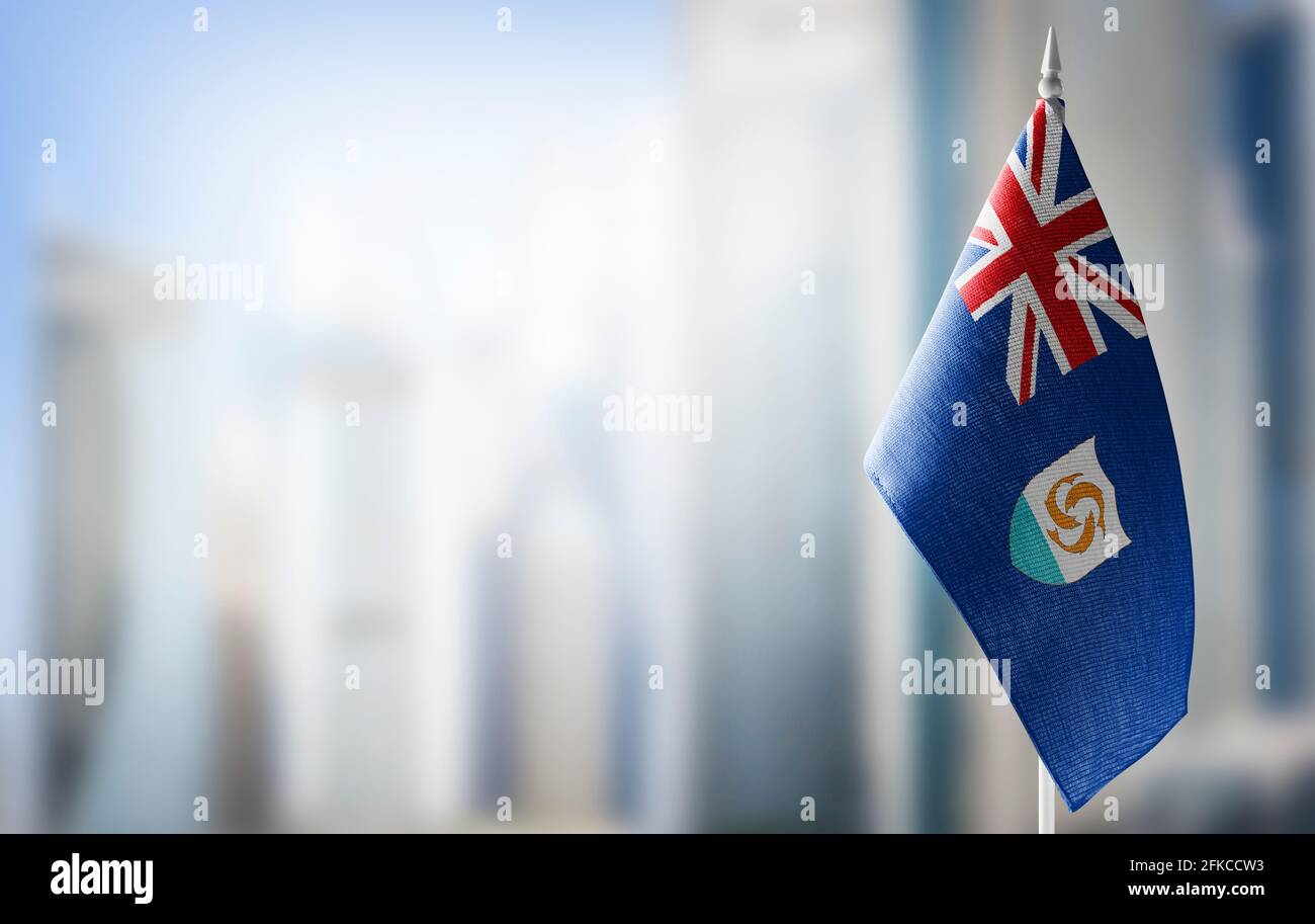 A Small Flag Of Anguilla On The Background Of A Blurred Background Stock Photo Alamy
