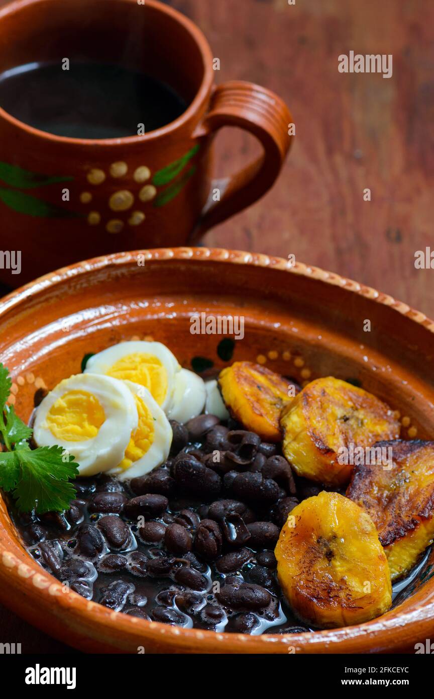 Traditional Mexican and Central American breakfast. Black beans and plantain Stock Photo