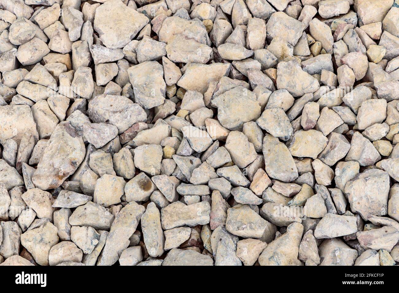 Various irregularly shaped, compacted stones as the basis for future