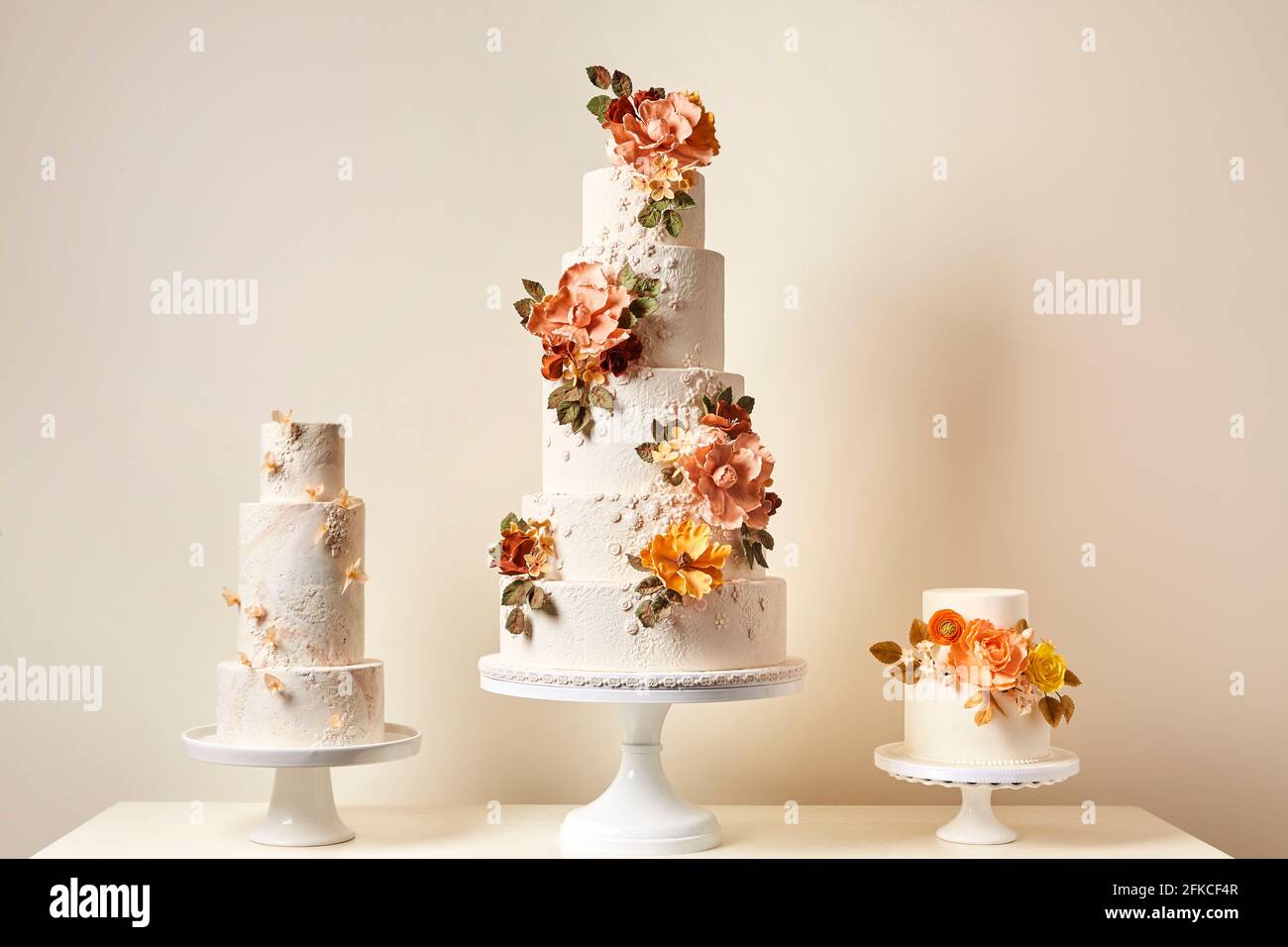 Three decorative wedding cakes on display Stock Photo - Alamy