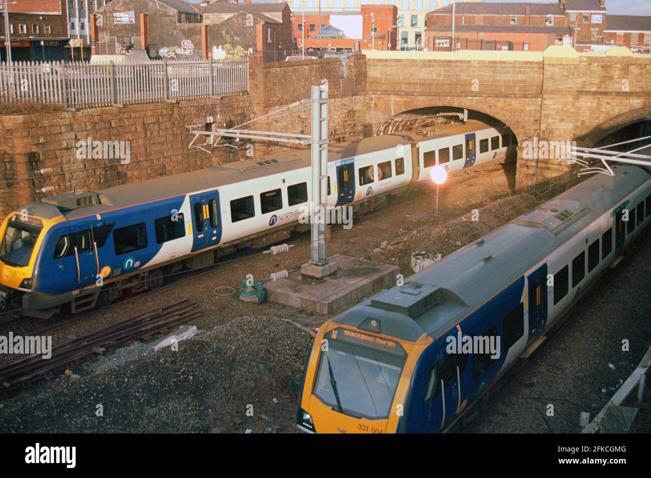 Bolton, UK - March 2021: Northern trains (Class 331) leaving and arriving Bolton station. Stock Photo