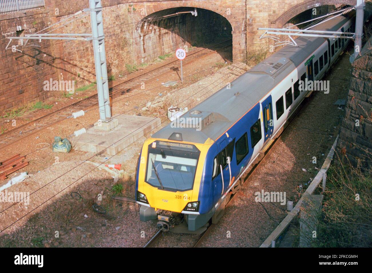 Bolton, UK - March 2021: A Northern train (Class 331) leaving Bolton station. Stock Photo