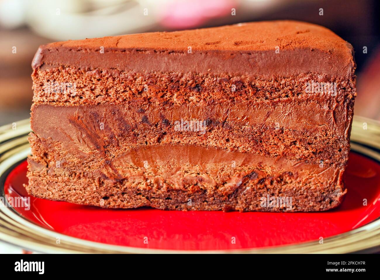 Real charming fresh tasty piece of chocolate cake for good mood Stock Photo