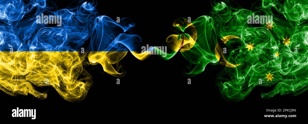 Ukraine, Ukrainian vs Australia, Australian, Cocos Islands smoky mystic flags placed side by side. Thick colored silky abstract smokes flags. Stock Photo