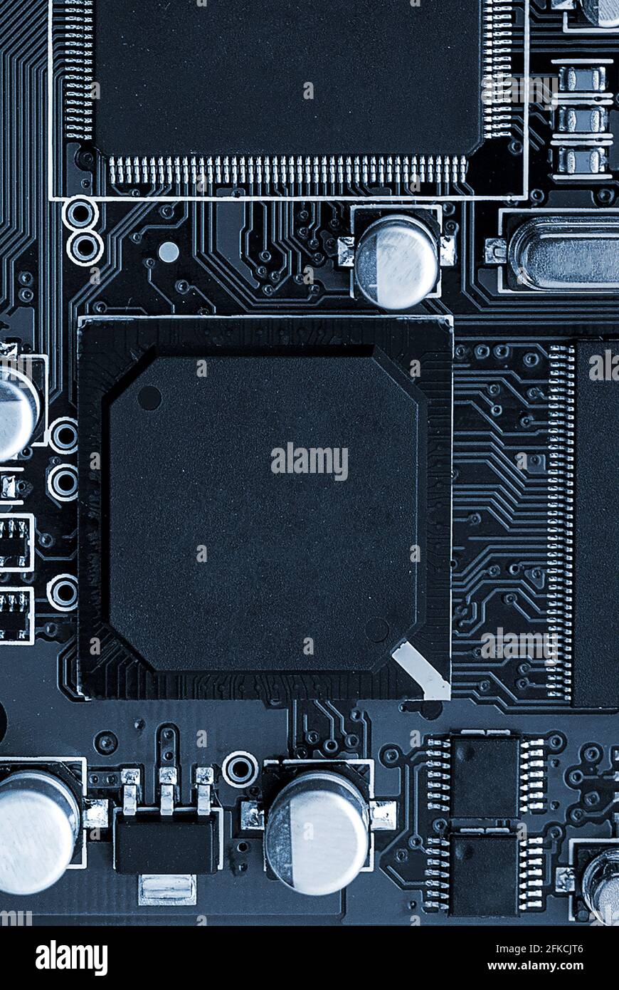 Electronic circuit board close up. toned. Vertical image Stock Photo