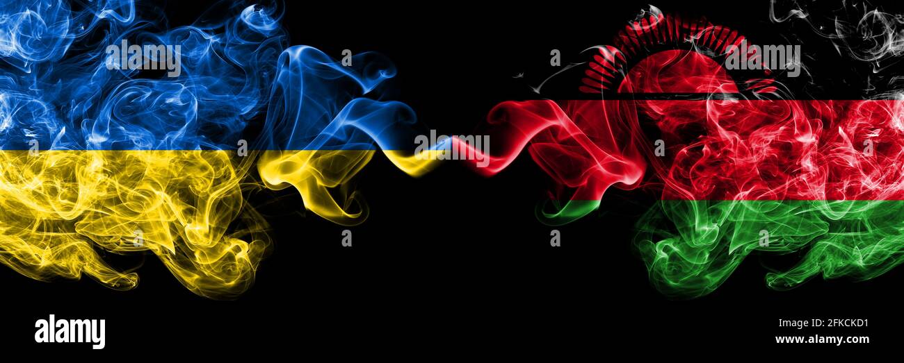 Ukraine, Ukrainian vs Malawi smoky mystic flags placed side by side. Thick colored silky abstract smokes flags. Stock Photo
