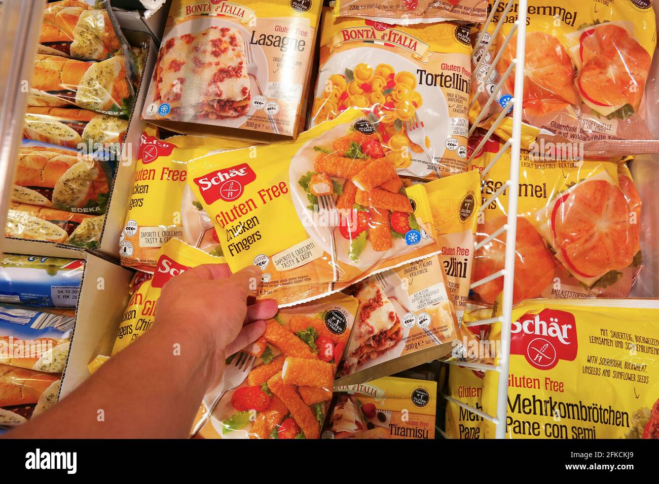 Schär gluten-free foods in de freezer of a Supermarket Stock Photo