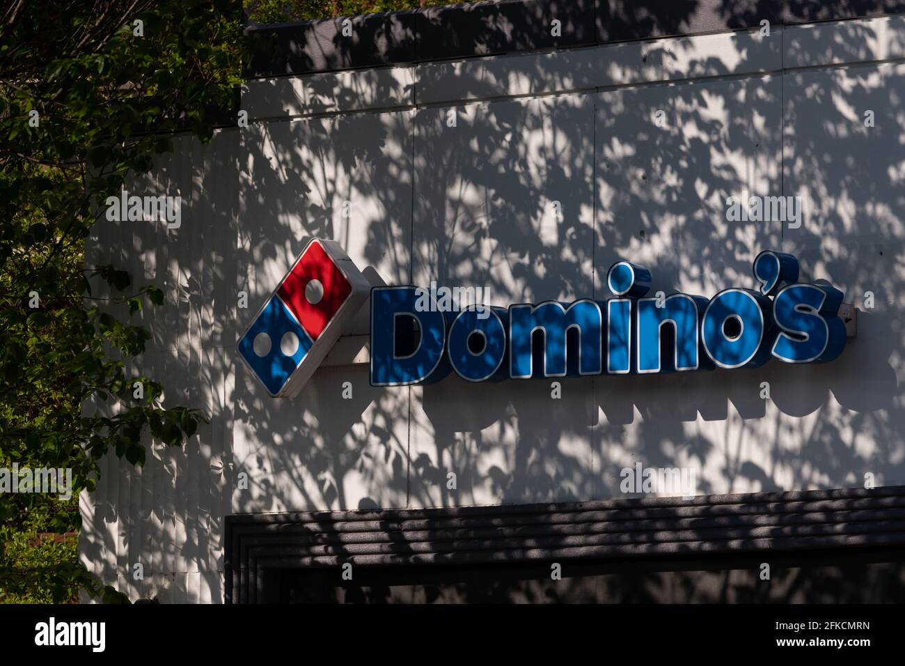 Washington, USA. 30th Apr, 2021. A general view of a Domino's pizza logo at a restaurant location in Washington, DC, on Friday, April 30, 2021, amid the coronavirus pandemic. Earlier this week President Biden gave his first address to Congress, as COVID-19 cases exponentially surge to unseen levels in India and confirmed case counts in America hover above 50,000 daily. (Graeme Sloan/Sipa USA) Credit: Sipa USA/Alamy Live News Stock Photo