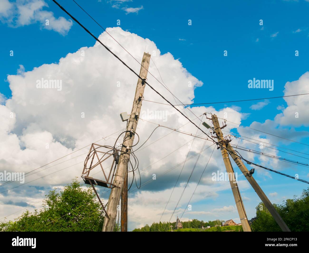Electric pole against the blue sky Stock Photo - Alamy